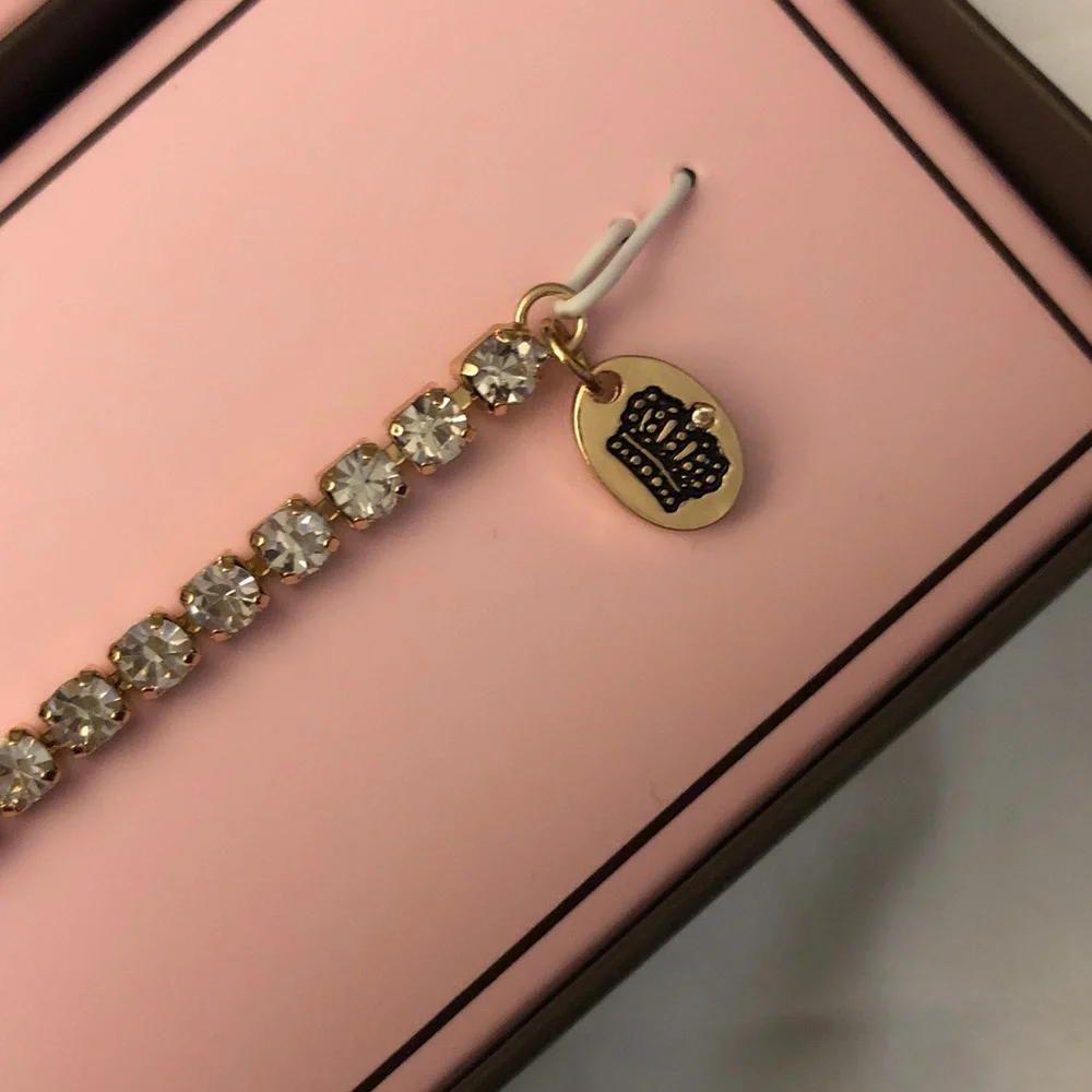 Juicy Couture Gold Tone Clear Crystal Tennis Bracelet Fixed Heart Charm NIB